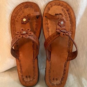 Flat leather thong sandals with toe loop